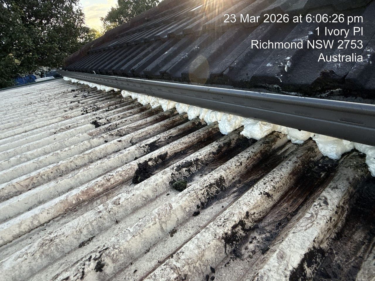 Damaged corrugated roof with debris requiring emergency repair Richmond NSW