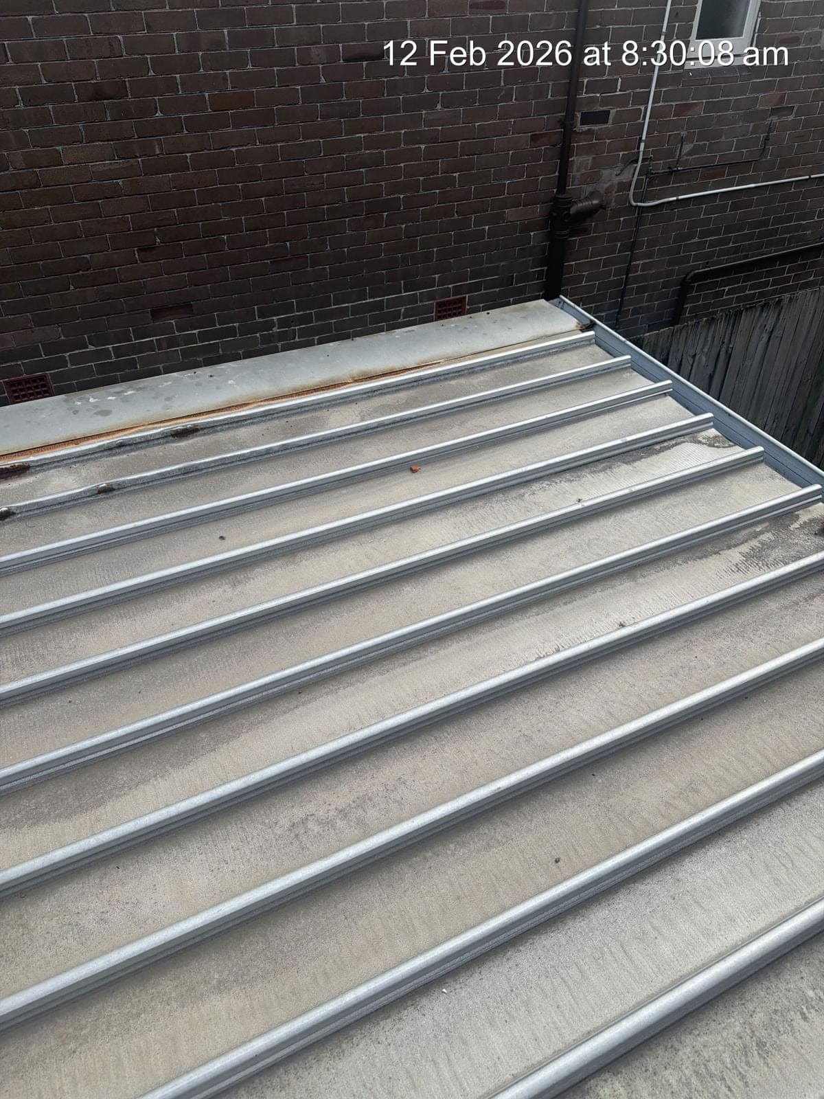 Before: Colorbond Flat Roof — Waverley