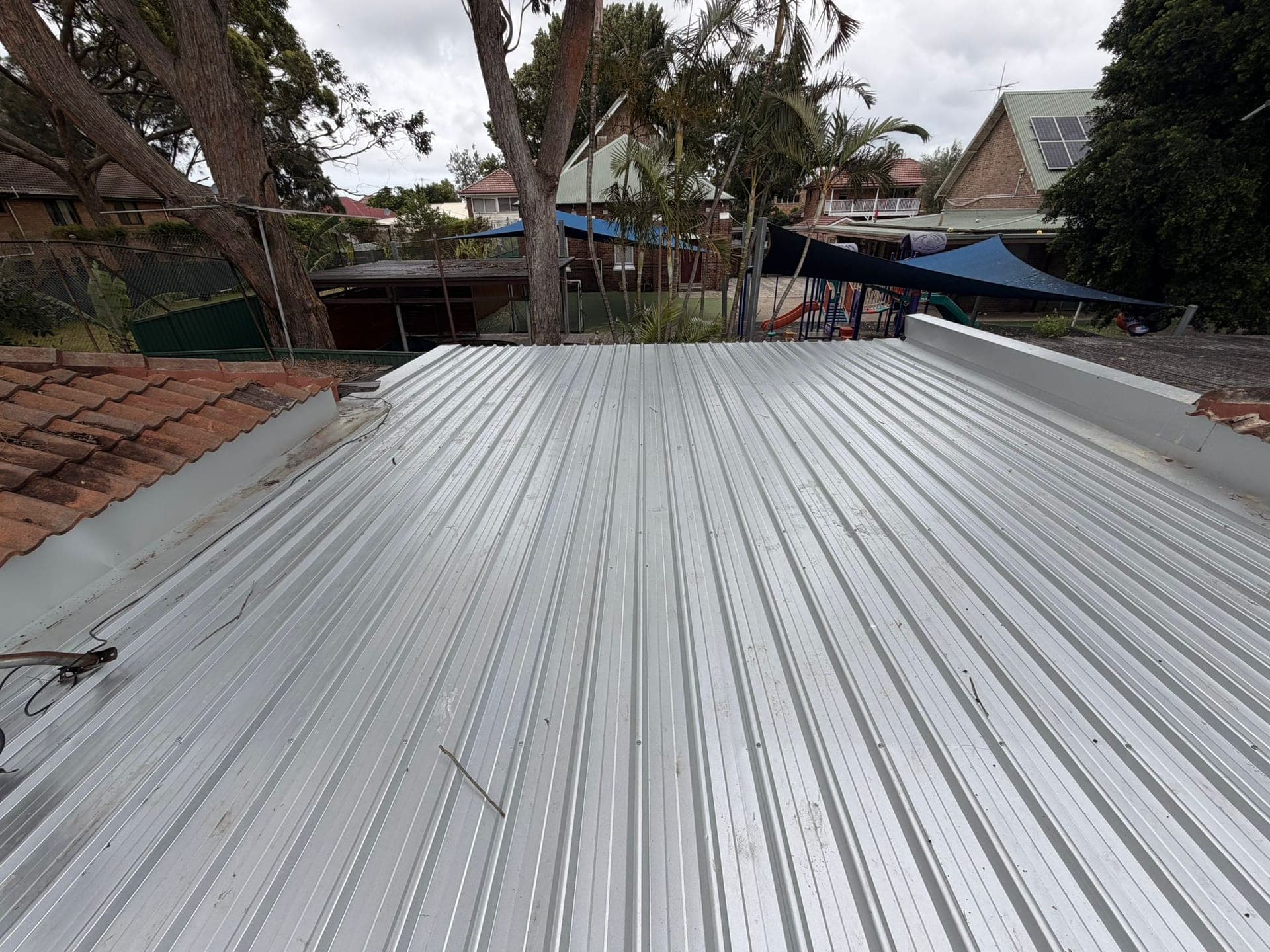 New Colorbond roof installation in progress Sydney residential
